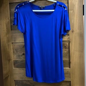 Super soft shirt with buttons across the shoulders and down the short sleeves.